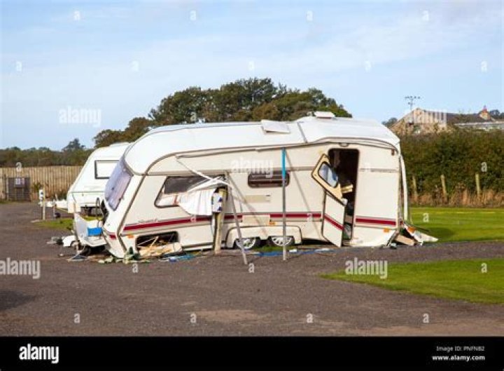 In high winds, a caravan has flipped on the Napier/Taupo Road